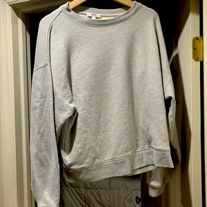 gray crewneck sweatshirt.
